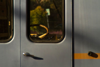 Reflection of train on window
