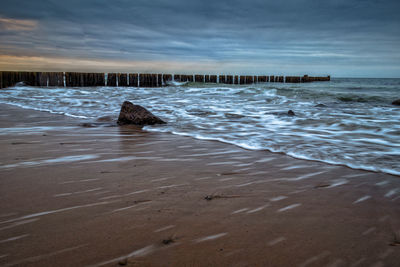Scenic view of beach against sky