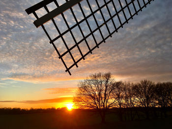 Low angle view of silhouette tree against sky during sunset
