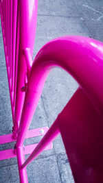 High angle view of pink bicycle on street