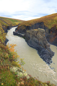 High angle view of river amidst rocks