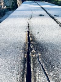 High angle view of tire tracks on street