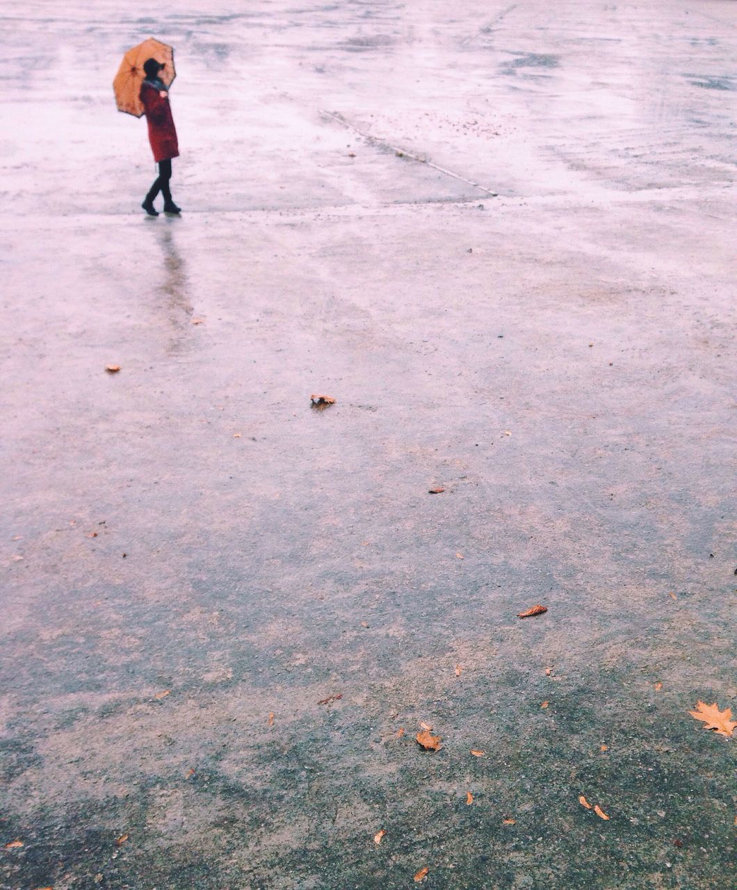 lifestyles, leisure activity, water, full length, walking, high angle view, men, standing, casual clothing, low section, street, outdoors, childhood, day, wet, person, puddle, reflection