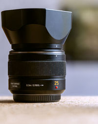 Close-up of camera on table