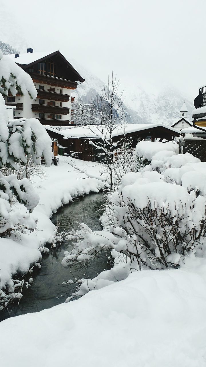 snow, winter, cold temperature, season, weather, covering, frozen, white color, mountain, snowcapped mountain, covered, nature, building exterior, tranquil scene, built structure, tranquility, beauty in nature, landscape, architecture, snow covered