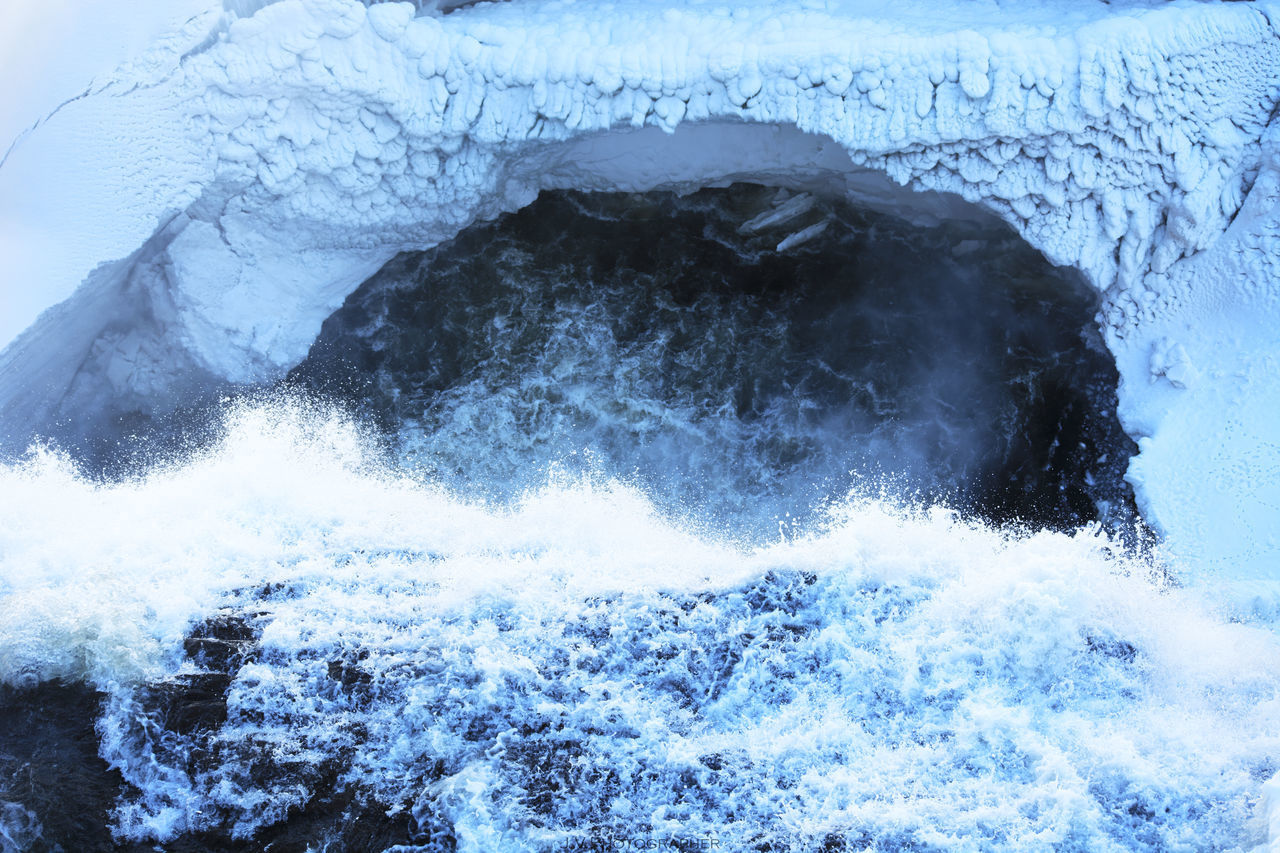 CLOSE-UP OF WAVES ON SEA