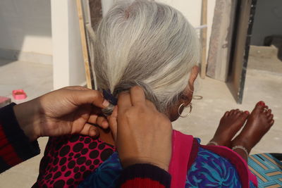 Cropped image of woman with blond hair