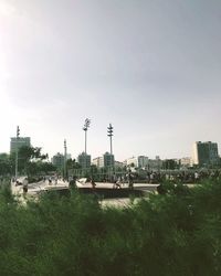 High angle view of buildings and city against sky