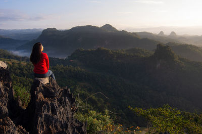 Women is hike on a clear day.  mountain climbing, rock climbing. ban jabo, mae hong son, thailand