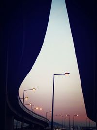 Highway overpass shot from below at dusk