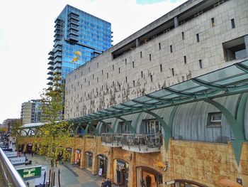 Low angle view of modern building against sky