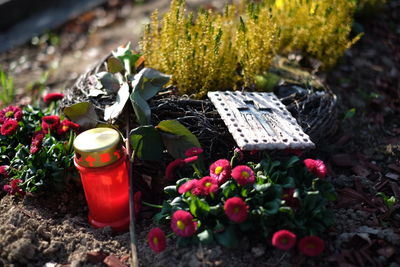 Cross and flowers at cemetery