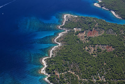 High angle view of surf on shore