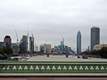 Modern buildings in city against sky