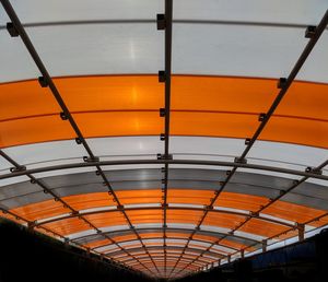 Low angle view of illuminated lights at sunset