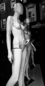 Full length of woman standing on bench