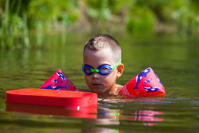 Portrait of boy in water