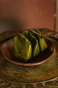 Close-up of bread in plate on table