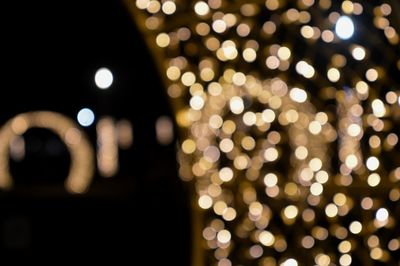 Defocused image of illuminated lights at night
