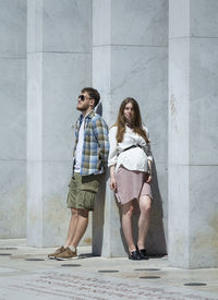 Young couple standing outdoors