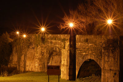 Illuminated street light at night