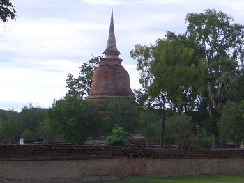 View of temple against cloudy sky