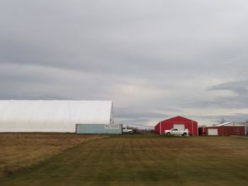 House on field against sky