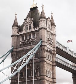 Low angle view of tower bridge against sky