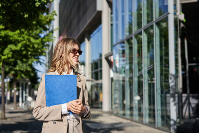 Young woman using mobile phone