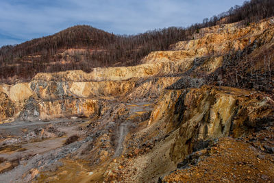 Old abandoned copper and gold surface mine in apuseni mountains, romania