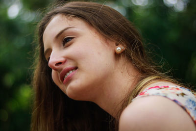 Close-up of smiling young woman