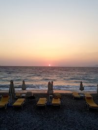 Scenic view of sea against clear sky during sunset