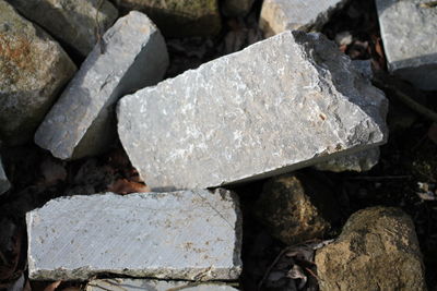 High angle view of stones on field