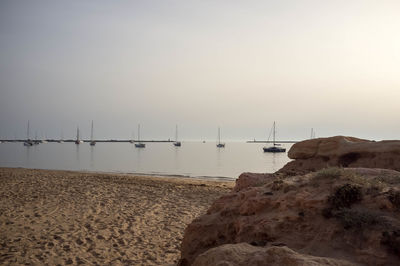 View of beach against sky during sunset