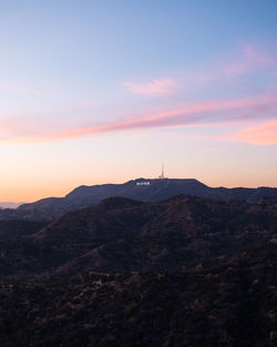 Scenic view of mountains against sky during sunset