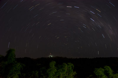 Scenic view of star field against sky at night