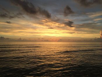 Scenic view of dramatic sky over sea