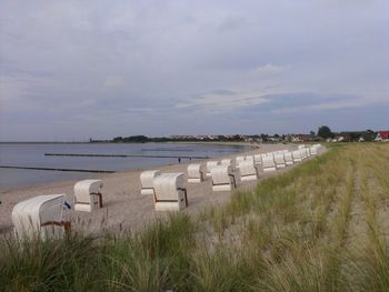 Scenic view of sea against cloudy sky