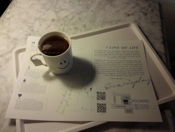 High angle view of coffee cup on table