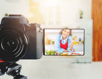 Close-up of camera on table