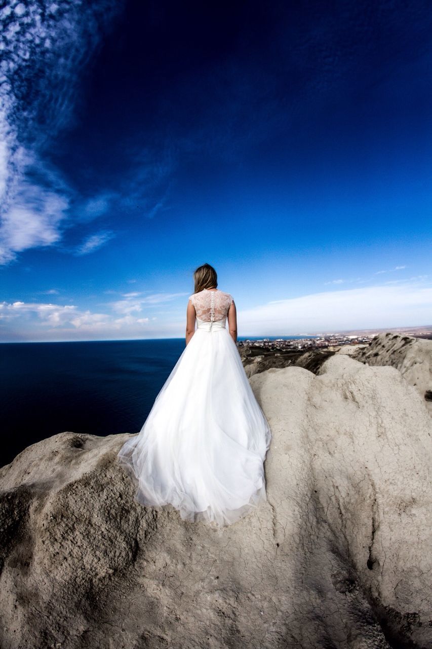 sea, horizon over water, sky, blue, water, tranquility, tranquil scene, scenics, nature, beauty in nature, cloud, beach, day, idyllic, cloud - sky, white color, sunlight, remote, rear view, outdoors