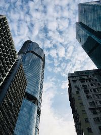 Low angle view of modern buildings against sky