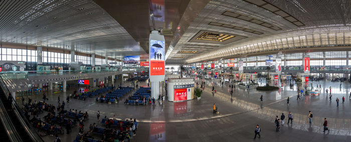 Group of people walking in airport