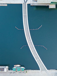 High angle view of sea against blue sky