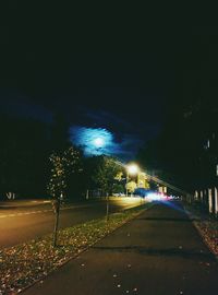 Illuminated road at night