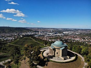 High angle view of townscape against blue sky