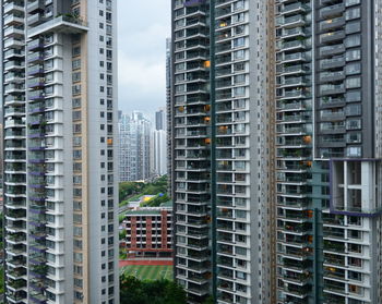 Skyscrapers in city against sky