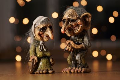 Close-up of figurines on table