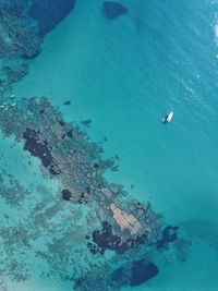 Aerial view of boat in sea