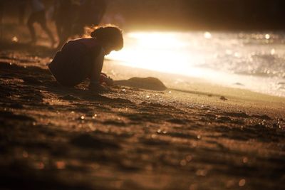 Silhouette of people at sunset